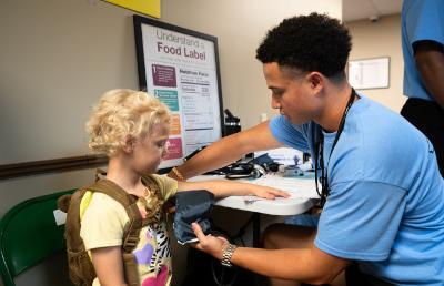 young man with little girl